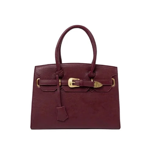 Burgundy handbag with decorative gold buckle